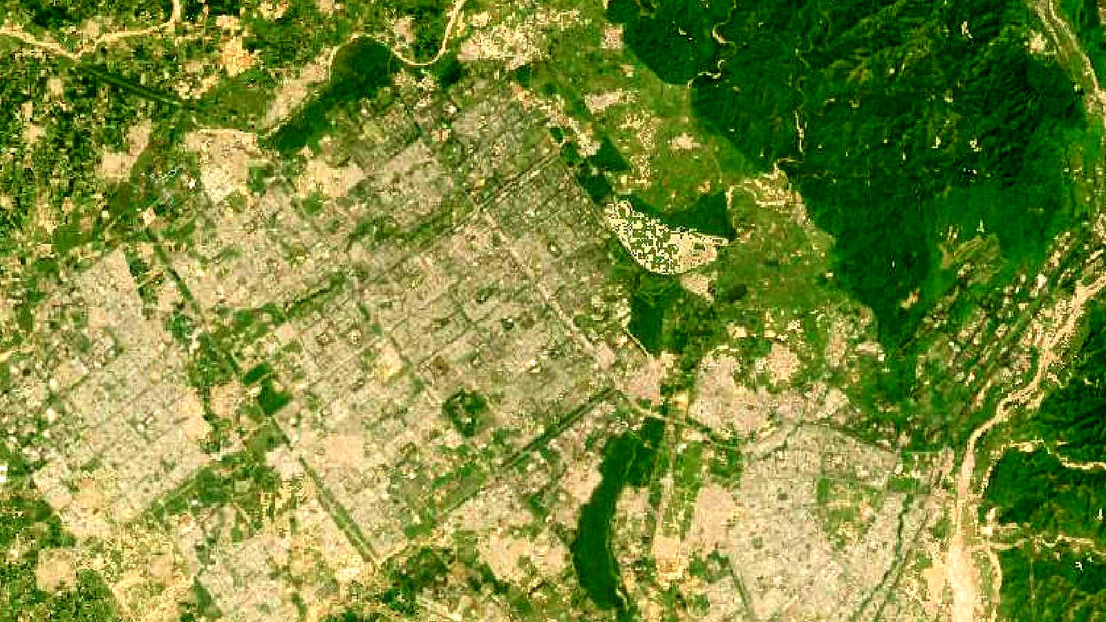 Landsat satellite view of Chandigarh's sector grid and Sukhna Lake
